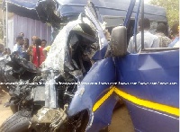Large portion of the right side of Sprinter mini bus was mangled with some section ripped