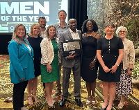 Dr. Kofi Asare-Bawuah [middle] with his award