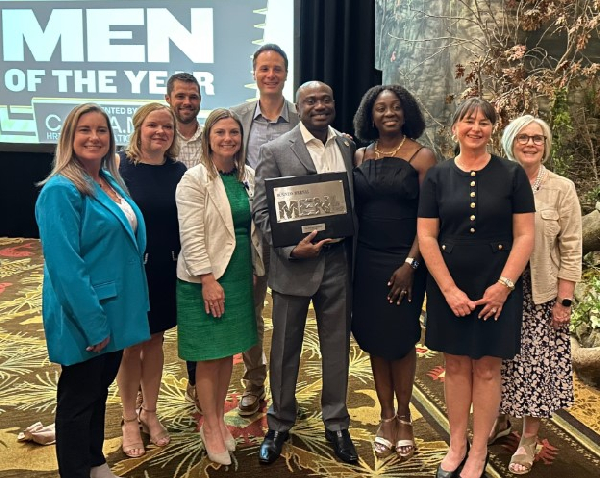 Dr. Kofi Asare-Bawuah [middle] with his award