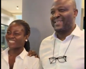 Ibrahim Mahama (R) invited the lady and another gentleman for a photograph