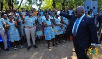 President Nana Akufo-Addo waves at students