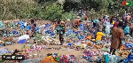 Watch as residents rush for free cloth after 40-foot cargo truck crashes on Mankessim-Accra Highway