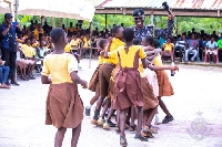 The IGP engaging in a fun time with the school children