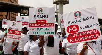 File foto of workers wey dey celebrate May Day for Abuja