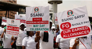 File foto of workers wey dey celebrate May Day for Abuja