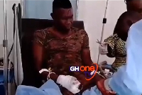 The injured soldier receiving medical treatment