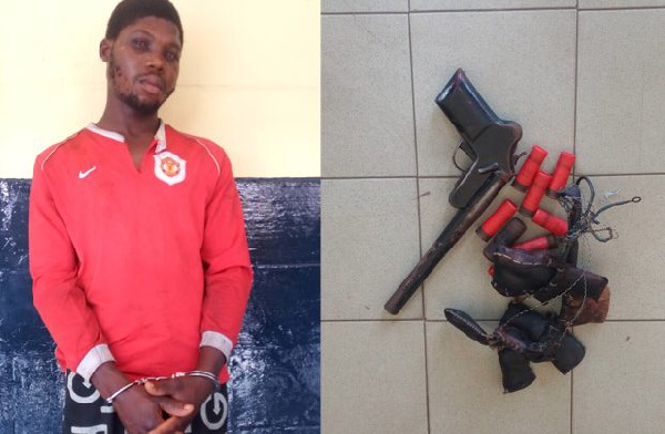 Ativi Nicholas Emmanuel Issah Mawutor with the gun and the talisman