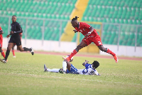 Kotoko's Emmanuel Antwi pulls out of a tackle