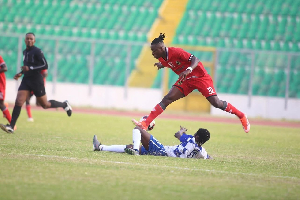 Kotoko's Emmanuel Antwi pulls out of a tackle