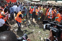Presdent Mahama actively involved in a sanitation day exercise