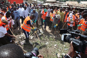 Presdent Mahama actively involved in a sanitation day exercise