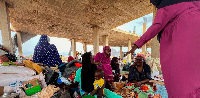 Families displaced by RSF advances shelter at a camp in Sudan on July 10, 2024.