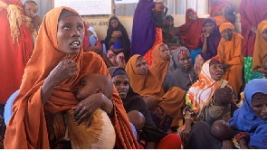 Internally displaced Somali women with their children at the feeding centre in Barwaaqo near Baidoa