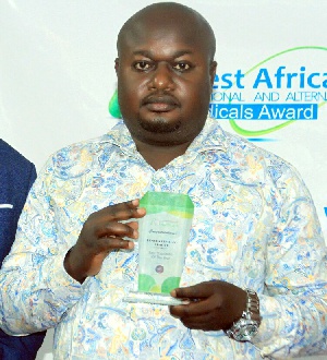 Dr. Kennedy Agyemang, Chief Executive Officer of Kenoga Company Limited with his award