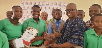 The winners with the Regional Director, Robert Kwesi Boame