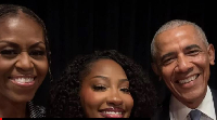 Tems (M) with former United States President, First Lady, Barack and Michelle Obama