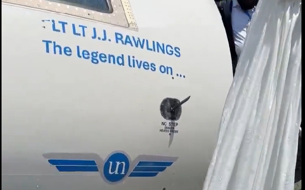A shot of the airplane with the inscription