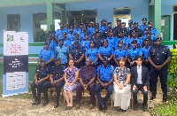 JICA officials in a group photo with the officers