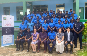 JICA officials in a group photo with the officers