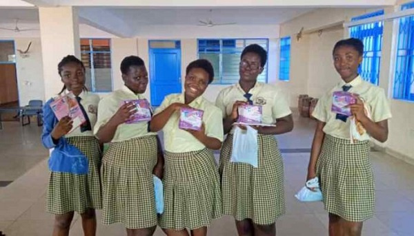 File Photo: Some students pose with a menstrual pad