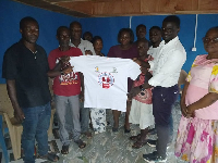 Executives captured in a photo with some members of the Yareyeya community