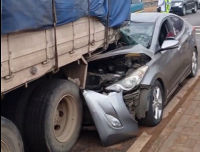 Salon car severely damaged at accident scene