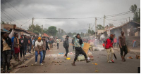 People protest a day after the general election following allegations of electoral irregularities