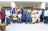 Isaac Mwinbelle in group photo with some GGSA staff and journalists after the workshop