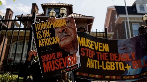 Activists protest outside the Ugandan Embassy over Uganda's parliamentary Anti-Homosexuality Bill