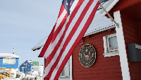 The U.S. flag flies outside their consulate in Nuuk, Greenland