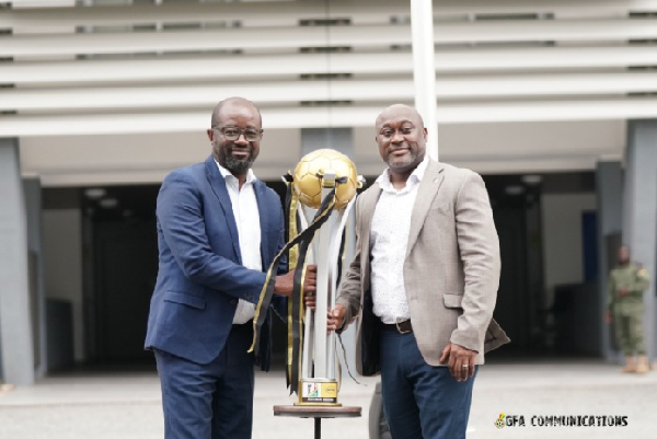 Ghana FA boss Kurt Okraku presents trophy to University of Ghana Pro Vice-Chancellor