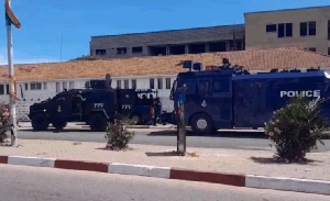 Police patrol vehicles stationed in front of the EOCO headquarters