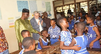 Haruna Iddrisu (left) and Robert Taliercio interacting with pupils of Osu St. Thomas Presby Primary
