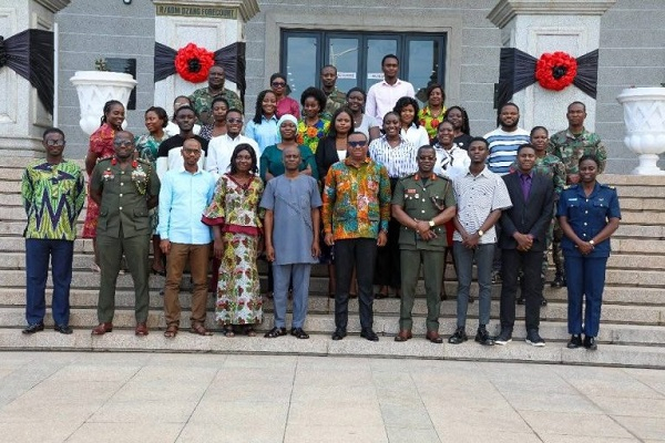 A group photo of staff of the Ministry of Defence with out-going National Service Personnel