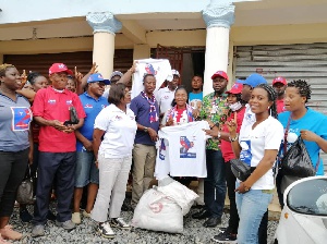 Members of the DPG donating t-shirts to NPP