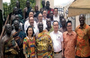 The Okyenhene in a pose with the Chinese Ambassador and others