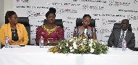 Madam Constance Swaniker (2nd from right) addressing the media