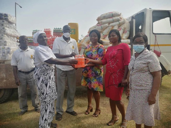 The CEO presenting the items to the beneficiaries