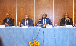 Togolese government officials addressing the media