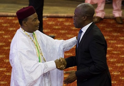 Vice President Amissah-Arthur in a handshake with President Mahamadou Issoufou of Niger