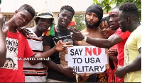 Wanluv the Kubulor with other protesters during the demonstration against Ghana