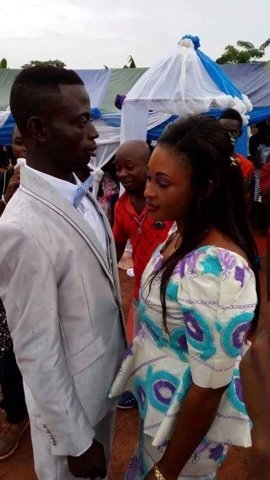 The bride and groom on their traditional wedding day