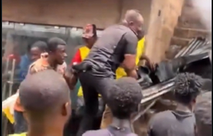 Watch As Aboso Youth Carry Police Officer Through Town Over Heroic Firefighting Efforts.png
