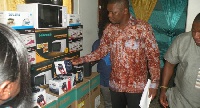 Mustapha Ussif inspecting some of the products