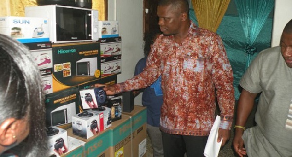 Mustapha Ussif inspecting some of the products