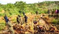 The Operation Vanguard joint task force recce team at an illegal mining site in the Central Region