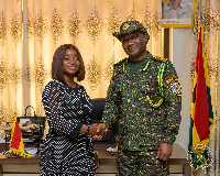 Comptroller-General of Immigration, Samuel Basintale Amadu (R) with Gloria Opoku Gyamfi (L)