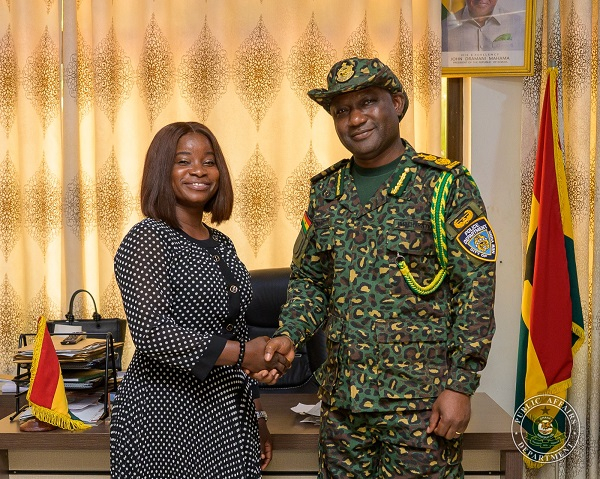 Comptroller-General of Immigration, Samuel Basintale Amadu (R) with Gloria Opoku Gyamfi (L)