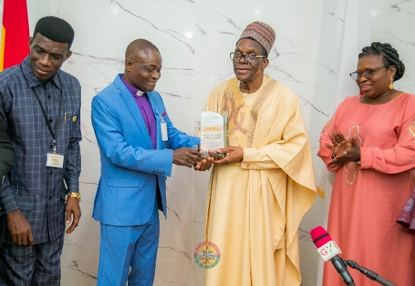 Alban Bagbin (second from the left) bing presented with the Defender of Faith award