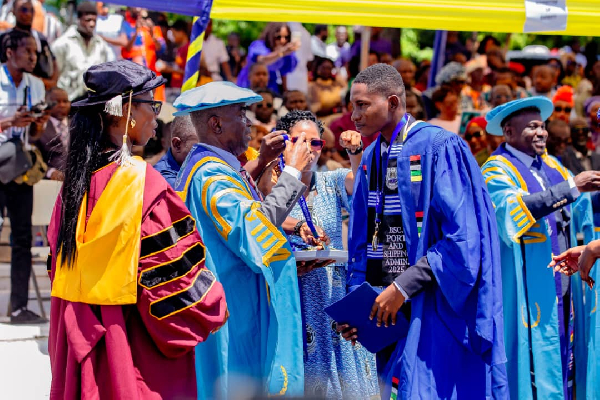 Regional Maritime University graduate students receiving their medals